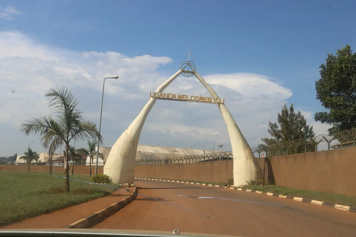 Tusk shaped welcome arch over a road near Entebbe